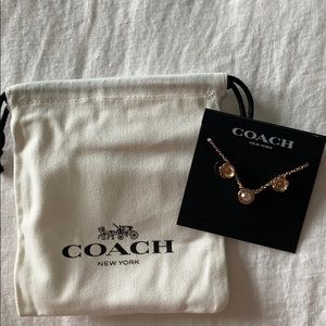 Coach rose gold earrings and necklace